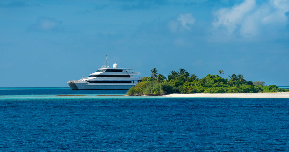 Four Seasons Explorer, a 39 meter, 3 deck catamaran takesup to 22 guests on a marine and cultural adventure into the undiscovered Maldives