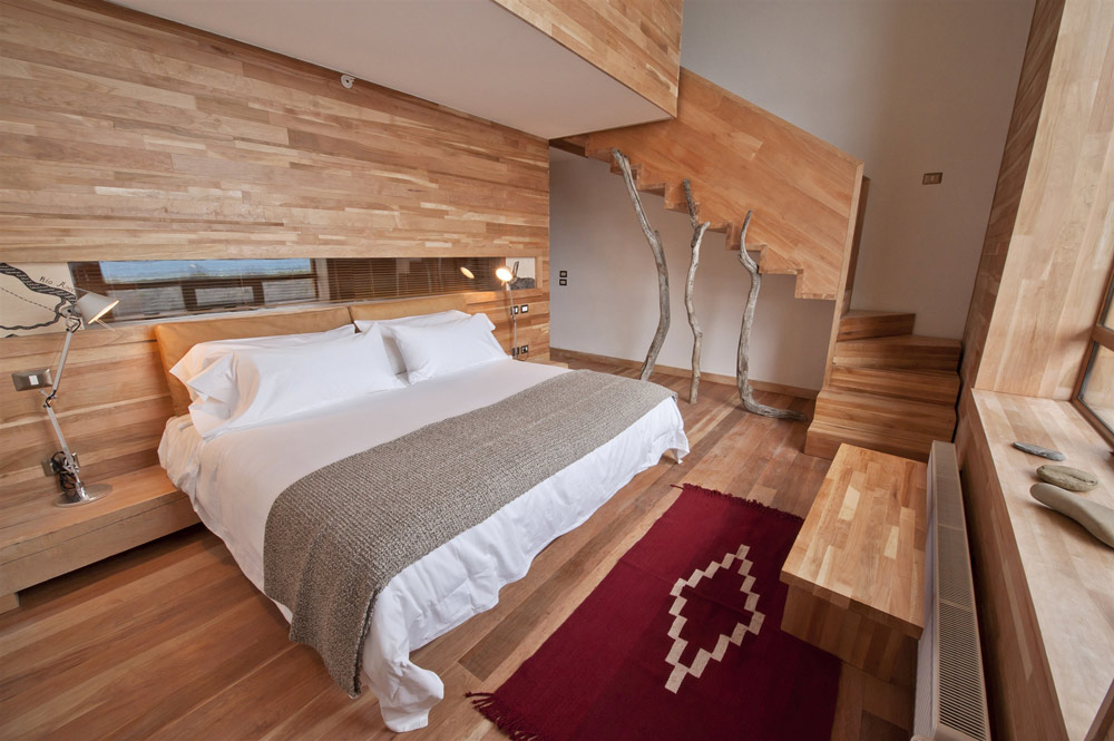 Split over two levelsthese generously sized suites (549 square feet 51 square meters) at Tierra Patagonia Hotel feature a cozy living room on the top floor and a large double room with ensuite downstairs