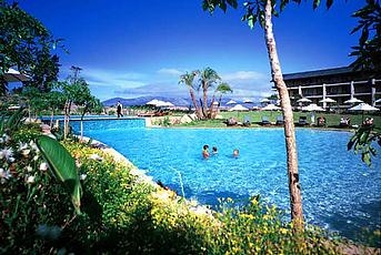 The outdoor, lagoon-like pool allows you to swim while taking in the beautiful landscape. The outdoor, lagoon-like pool allows you to swim while taking in the beautiful landscape.