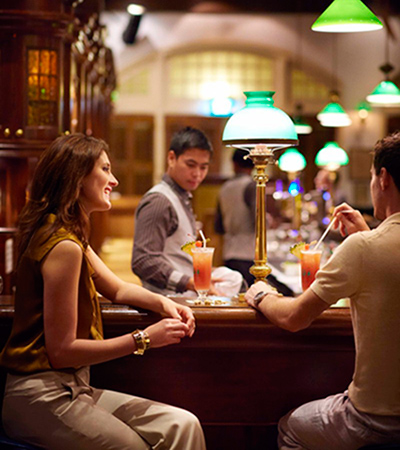 Raffles Hotel Singapore's Long Bar, home of the Singapore Sling. Raffles Hotel Singapore's Long Bar, home of the Singapore Sling.