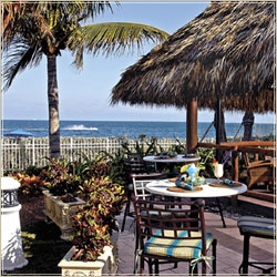 Relax and dine oceanfront at in our casual Chickee Hut at The Sandbar Grill...also perfect to grab a bite for poolside lounging. Relax and dine oceanfront at in our casual Chickee Hut at The Sandbar Grill...also perfect to grab a bite for poolside lounging.