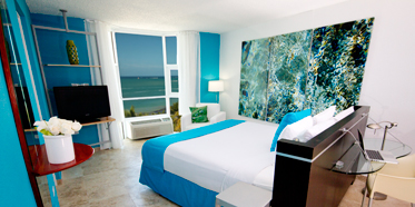 Guestroom at San Juan Water and Beach Club Hotel