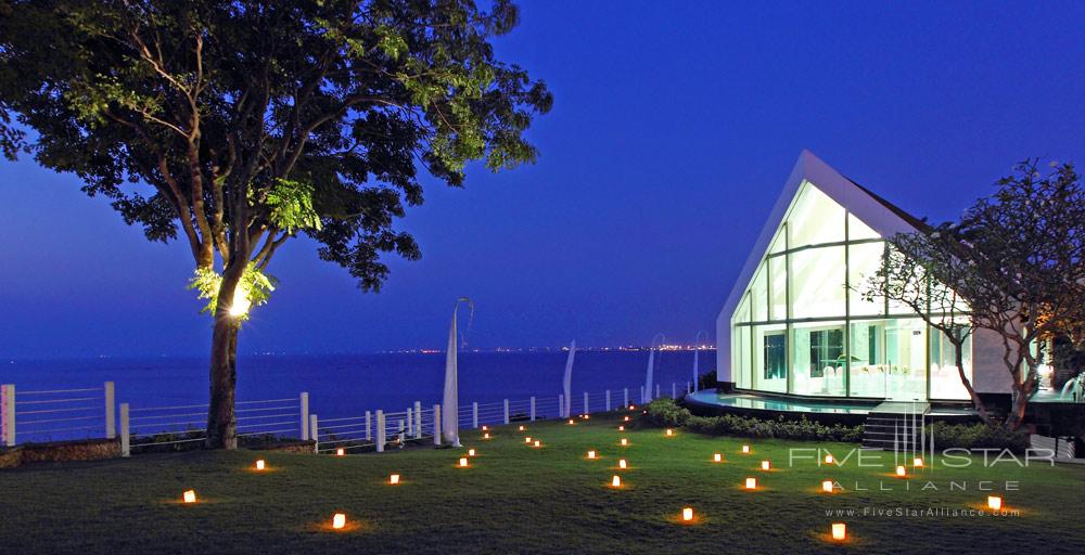 Tresna wedding chapel in Bali available for booking through AYANA Resort and Spa is a dramatically-illuminated chapel that majestically towers above the Indian Ocean. It features a see-through glass aisle with a flowingstone-lined river underneath that leads to a magnificent glass altar