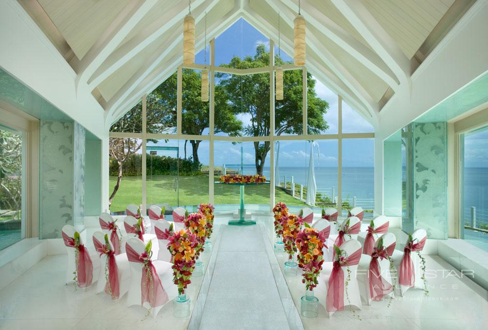 Tresna wedding chapel in Bali available for booking through AYANA Resort and Spa is a dramatically-illuminated chapel that majestically towers above the Indian Ocean. It features a see-through glass aisle with a flowingstone-lined river underneath that leads to a magnificent glass altar