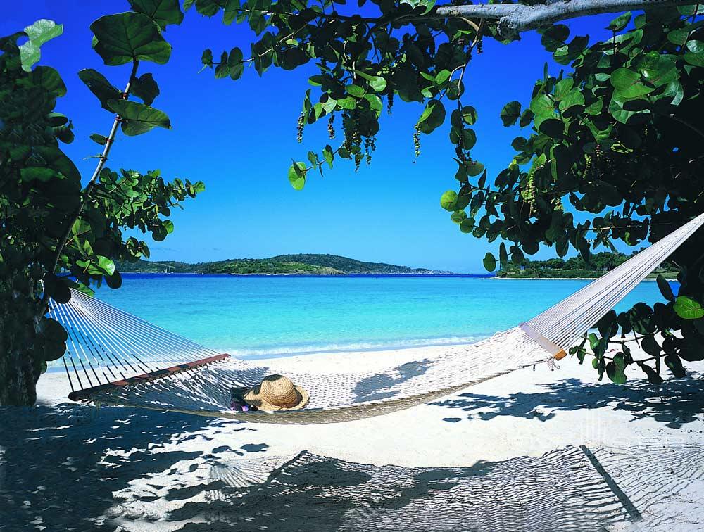 Relax and Lounge on Beach Hammocks at Caneel BaySt. John, United States