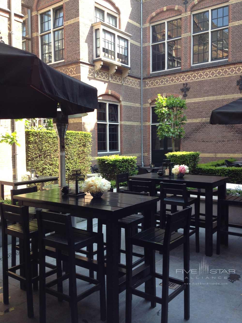 Outdoor lounge area at The College Hotel, Amsterdam