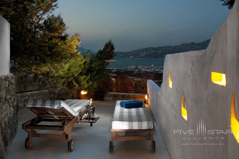 Enjoy a Glass of Wine Looking Over the Private Balcony at Tharroe Mykonos
