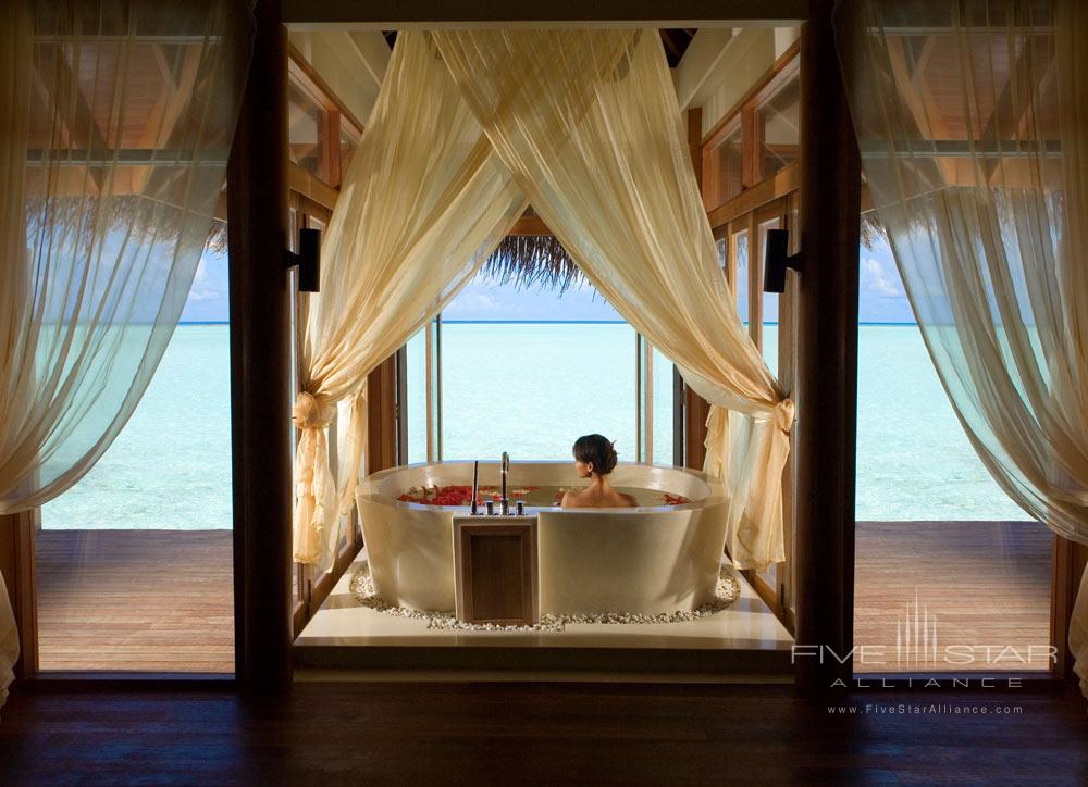 Overwater bungalow bath at Anantara Resort Dhigu Maldives