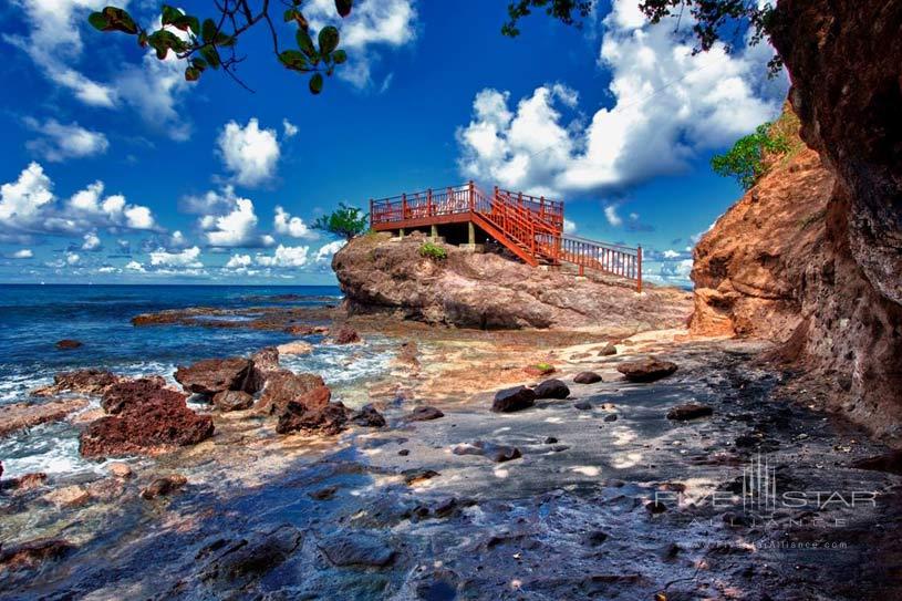 Secluded dining area Rock Maison which is surrounded by the waves on three sides, has stunning panoramic views of the Caribbean Sea towards Pigeon Island and Martinique.