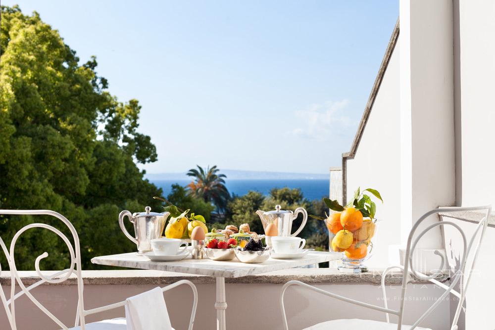 Dining at the terrace of Junior Suite Sea View Room at Grand Hotel Cocumella in Sant'Agnello di Sorrento, Italy