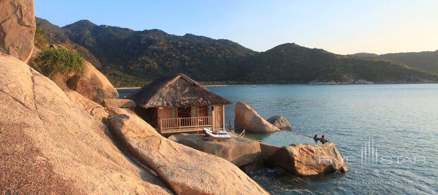 The unique Rock Pool Villas are lapped by the balmy waters of the East Vietnam Sea. Each has a private plunge pool set into the rocks. The villas offer separate sleeping and living areas. They are elegant and spaciouscombining en-suite bathroomswalk-in-closetsseparate vanity areas and handcrafted bathtubs. The villas are accessed by a scenichillside staircase and far from other villasthus ensuring absolute privacy.