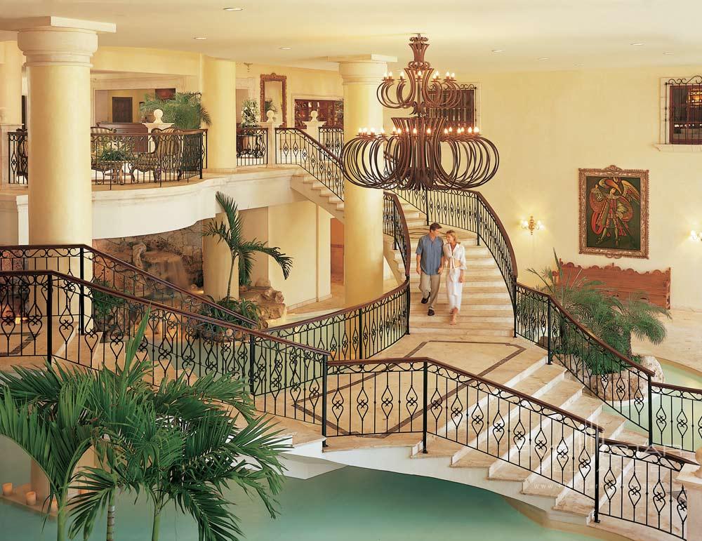 Grand lobby staircase at Secrets Capri Riviera Cancun in Playa del Carmen, Mexico