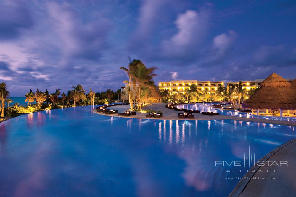 Night view of the infinity pool at Secrets Maroma Beach Riviera Cancun in Playa Del Carmen, QR, Mexico