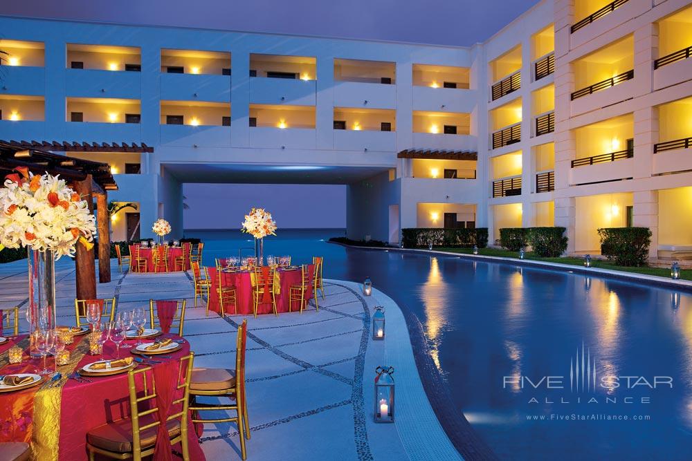 Dinner Setup Overlooking Infinity Pool at Secrets Silversands Riviera Cancun