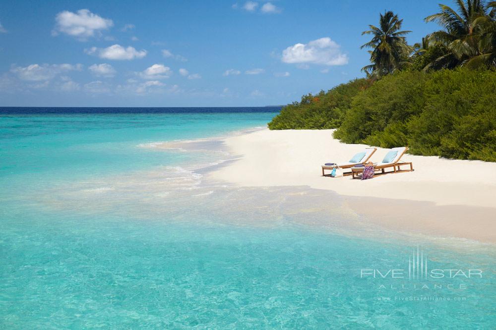 White Sandy Beach with Private Sun Lounges at Dusit Thani Maldives