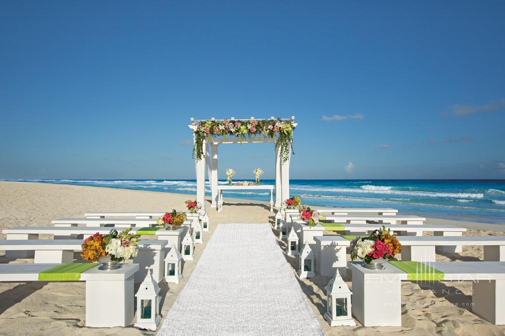 Beach wedding at Secrets The Vine Cancun, Mexico