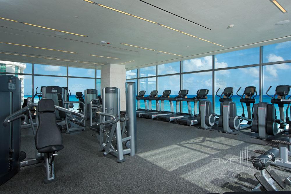 Fitness center overlooks the sparkling Caribbean at Secrets The Vine Cancun, Mexico