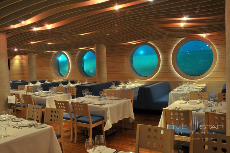 Swissotel Buyuk Efes Aquarium Restaurant. The Aquarium Restaurant features large porthole windows overlooking the swimming pool. A relaxed indoor and outdoor venuethe restaurant specializes in Greek and Mediterranean dishes and entertainment.