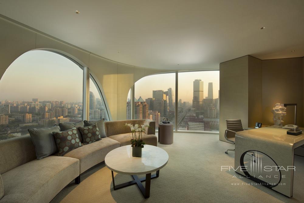 Executive suite living room with city view at Conrad Beijing, China