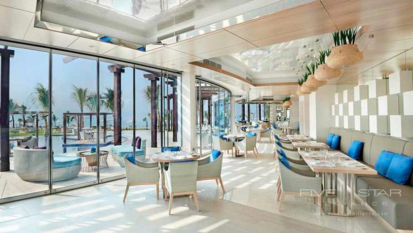 Palm Avenue poolside restaurant atWaldorf Astoria Dubai Palm Jumeirah