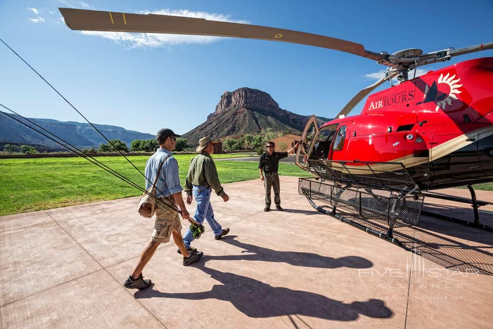 Guests Taking a Helicopter Lift to Enjoy Fishing at Gateway Canyons Resort and Spa