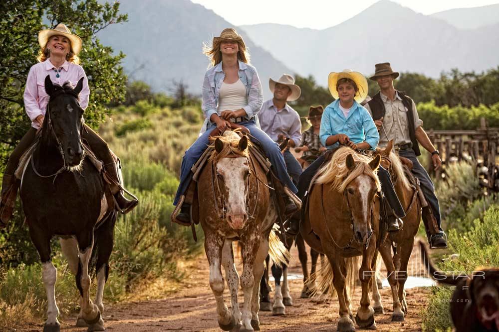 Family Enjoying Horseback Activity at Gateway Canyons Resort and Spa