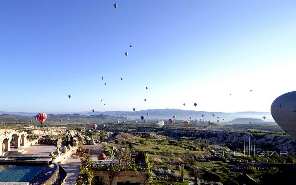 View of Museum Hotel Cappadoccia and surrounding valley from hot air balloon.