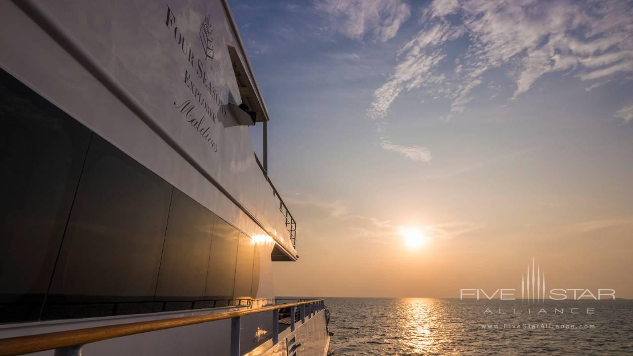 Sunset view from the Four Seasons Explorer catamaran yacht in the Maldives