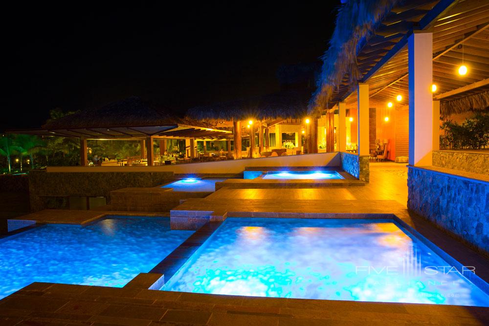 Waterfall Pool by Night at Indura Beach &amp; Golf Resort