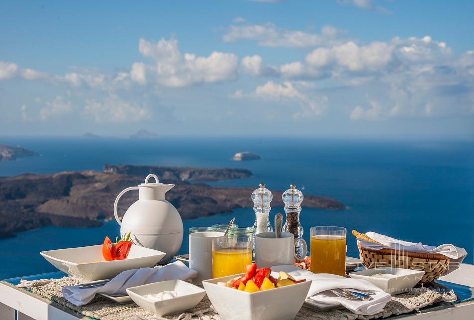 Enjoy breakfast with breathtaking views at Iconic Santorini, Greece
