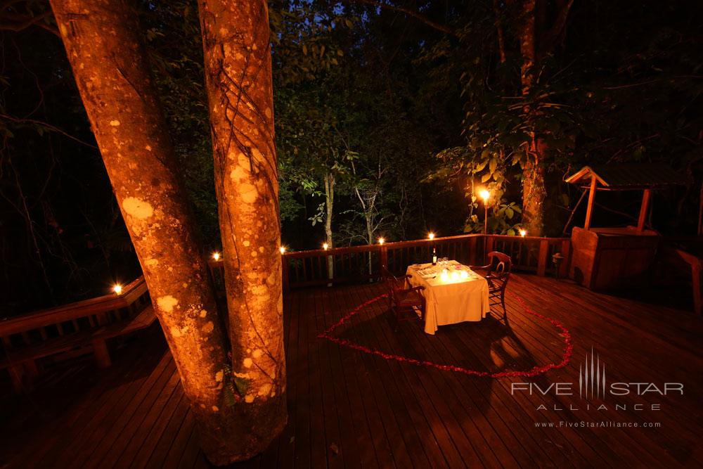 Enjoy a private dinner on the River Corinto at The Lodge and Spa at Pico Bonito, La Ceiba, Honduras