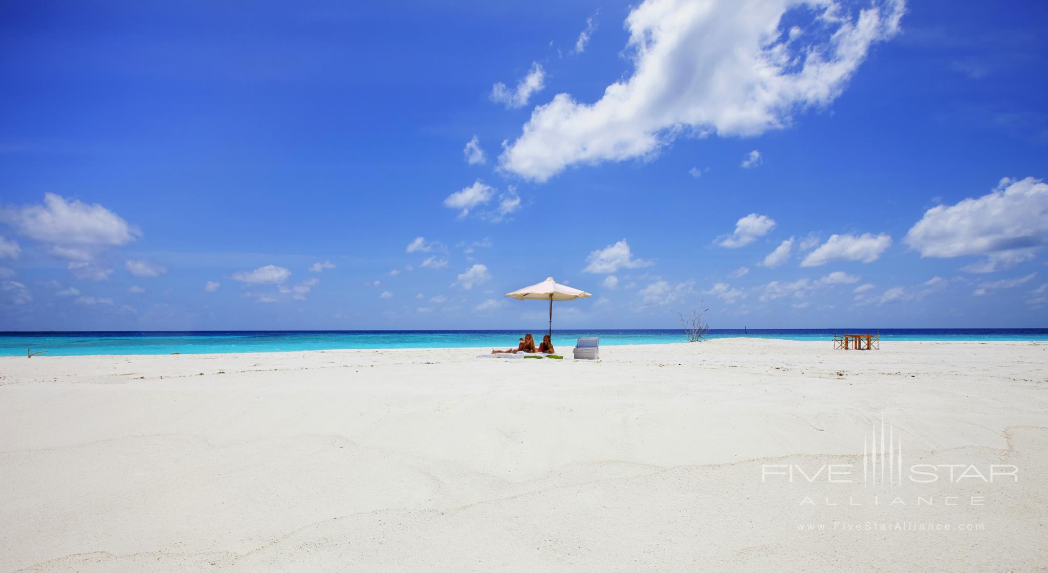 Sandbank Sunbathing at Six Senses Laamu