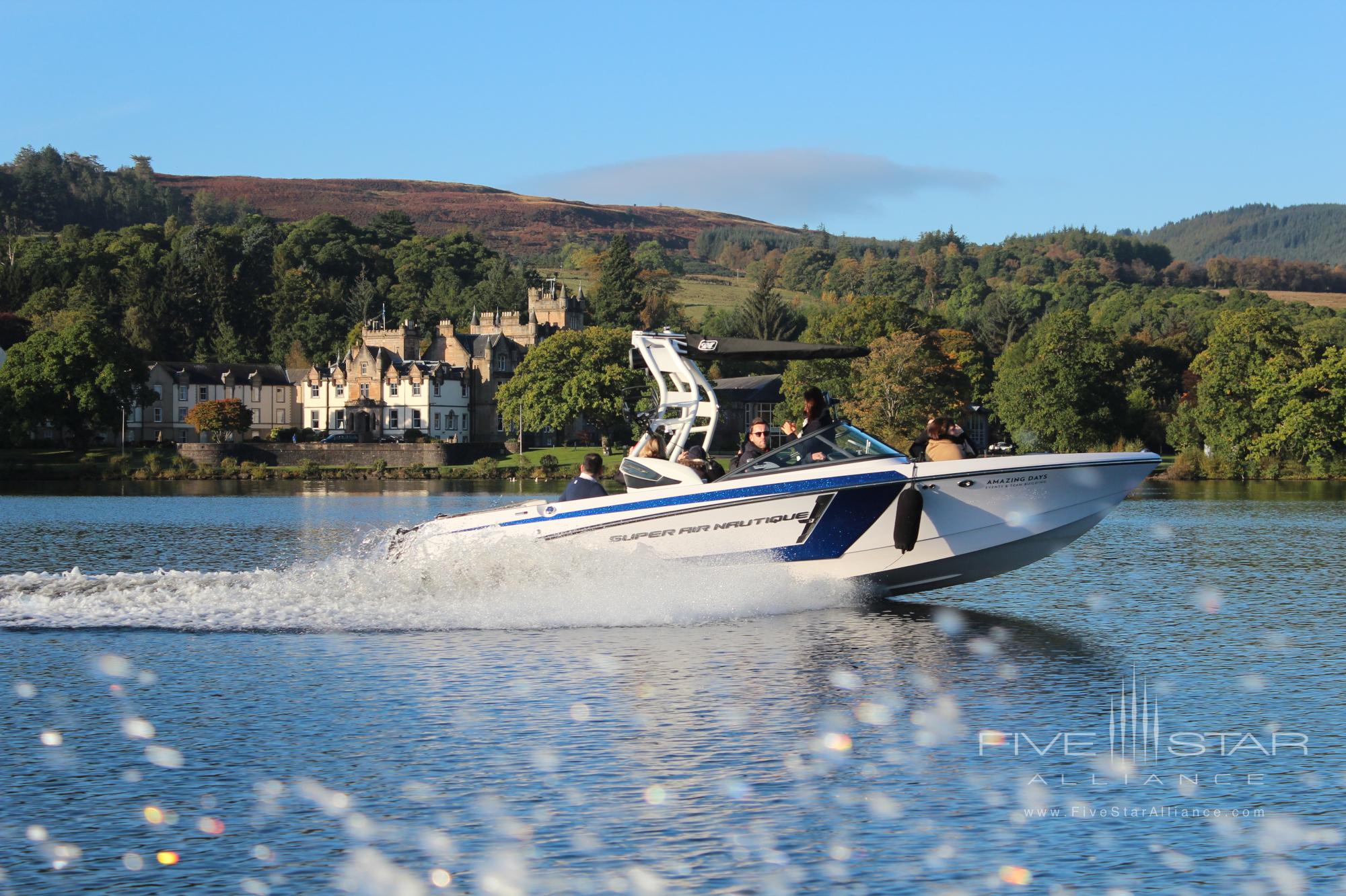 Speedboat in front of Cameron House on Loch Lomond