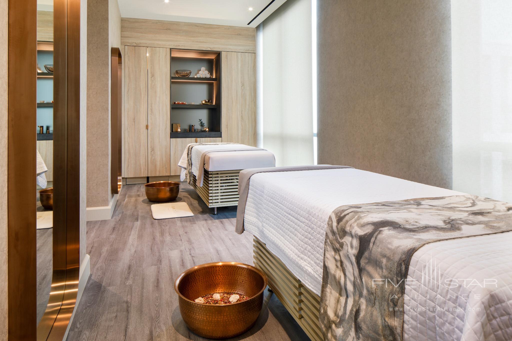 The couple's treatment room at Rose at The Joseph in Nashville features soothing massage tables and oversized copper bowls designed for a rose-infused welcome ritual.