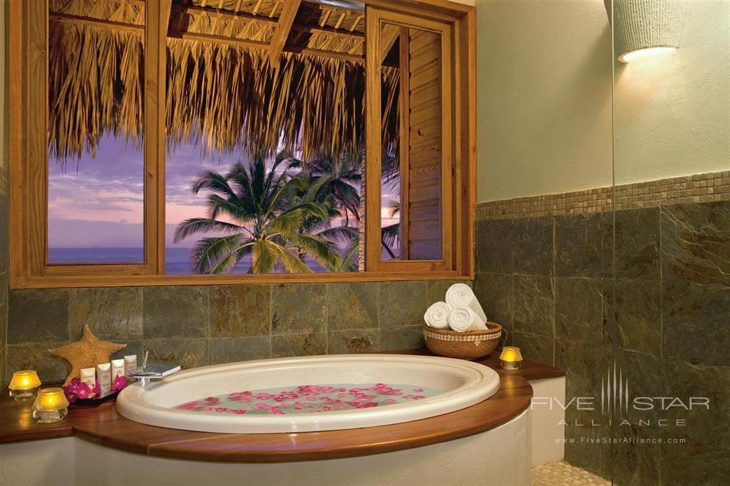 Romantic soaking tub at Zoetry Agua Punta Cana
